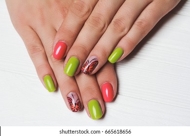 Pink   green nail art and butterfly white background