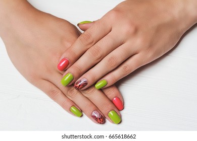 Pink   green nail art and butterfly white background