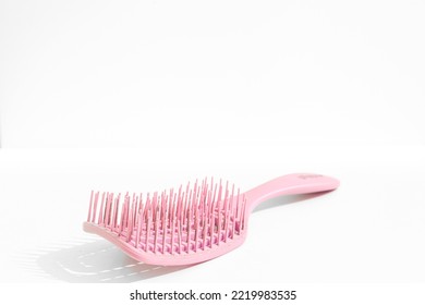 Pink Hairbrush Isolated On White Background