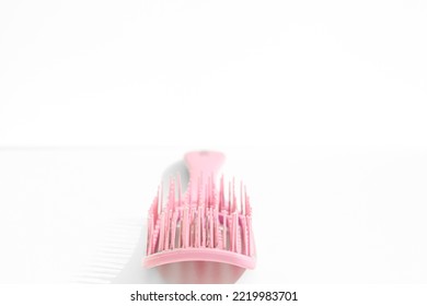 Pink Hairbrush Isolated On White Background