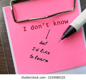Pink handwritten note I DON'T KNOW, adding BUT I'D LIKE TO LEARN, concept of being curious, admit that you don’t know something but be ready to learn more about it
