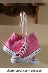 pink high top tennis shoes