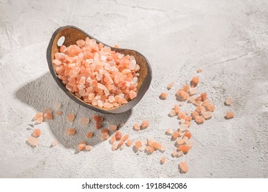 pink himalayan salt, in bowl on white background