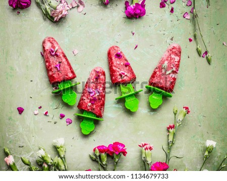 Image, Stock Photo Red fruit ice cream on a stick