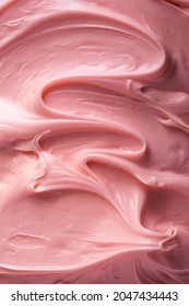 Pink icing frosting close up texture