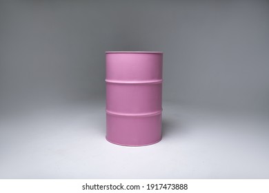 pink iron barrel for fuel. photo studio equipment. White cyclorama.   