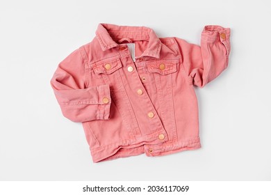 Pink Jeans Jacket. Baby Clothes For Spring, Autumn Or Summer On  White Background. Fashion Kids Outfit. Flat Lay, Top View