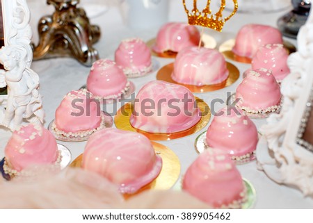 pink jelly cakes delicacies on the holiday table in restaurant