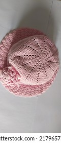 A Pink Knitted Hat From The Top View