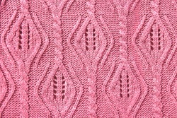 Pink Knitted Pattern With Rhombuses And Pigtails With Soft Blur
