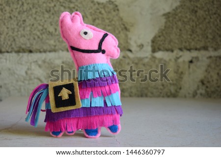 Pink lama. Toy from felt with your own hands. DIY concept for children. Handmade crafts. Step 6. Finished toy.
