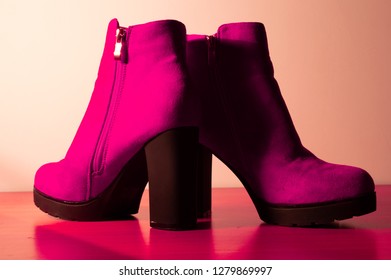 pink leather shoes, pink background