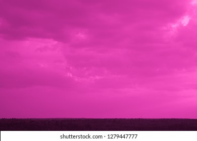 Pink light in the sky