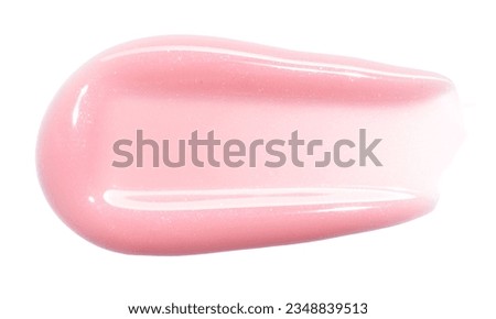 Pink lip gloss texture isolated on white background. Smudged cosmetic product smear. Makup swatch product sample