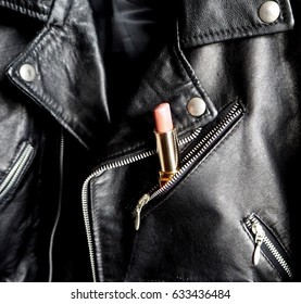 Pink Lipstick In A Pocket Of A Studded Jacket