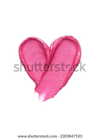 Pink lipstick shimmering texture in heart shape, texture stroke isolated on white background. Cosmetic product swatchheart shape; 
