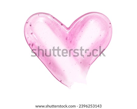 Pink lipstick shimmering texture in heart shape, texture stroke isolated on white background. Cosmetic product smear smudge swatch