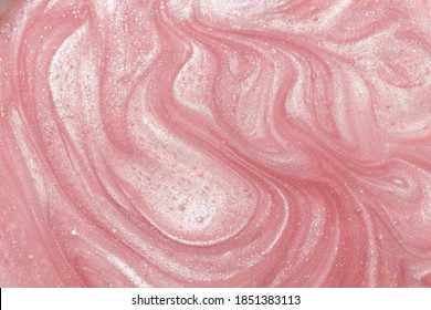 Pink liquid shimmering cosmetic product studio shot. - Shutterstock ID 1851383113