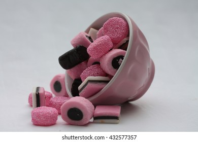 pink liquorice allsorts in a pink bowl