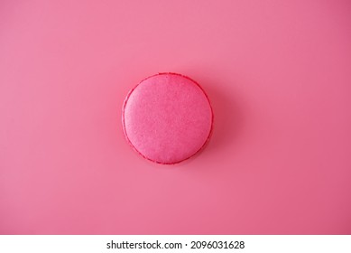 Pink macarons with chocolate berry cream cheese filling. toning. selective focus 