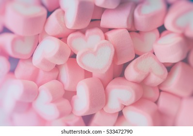 Pink Marshmallow In Heart Shape Stacked On Blue Wood Table With Copy Space. Sweet Candy For Love Theme On Valentine Concept In Vintage Style. Pastel Color Dessert For Background Or Wallpaper Decor.