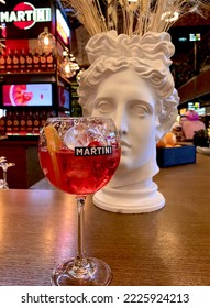 A Pink Martini With Ice In A Crystal Glass On A Wooden Table. Friday Night Bar. Booze, Fun And Hilarious. New York, 2022-11-11.