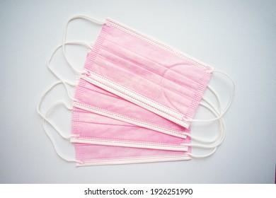 Pink Medical Mask On A White Background
