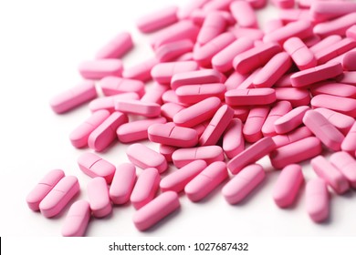 Pink Medicine Pills On White