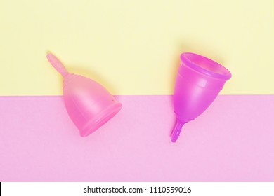 Pink Menstrual Cup On Color Background, Female Intimate Hygiene Period Products, Top View