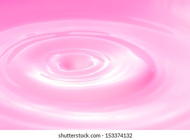 pink milk or pink liquid drop created ripple 