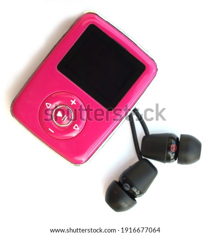 pink mp3 player electronical device