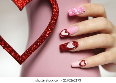 Pink Multicolored Manicure On Long Nails With Hearts.