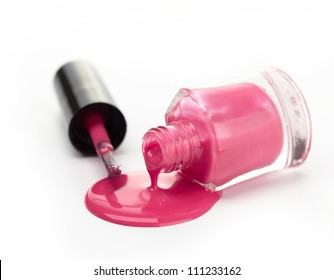 Pink Nail Polish And Brush On White Background