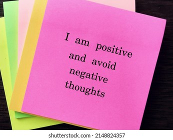 Pink Note With Message I AM POSITIVE AND AVOID NEGATIVE THOUGHTS, Concept Of Affirmation Message Or Self Talk To Challenge Negative Inner Voice And Boost Self Esteem