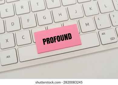 A pink note with the word 