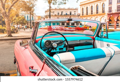 Pink old american classic car in Havana, Cuba