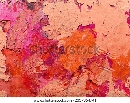 Pink and orange cracked thick paint wall texture. Artistic contemporary background.