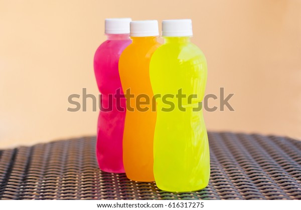 Download Pink Orange Yellow Bottles Juice On Royalty Free Stock Image PSD Mockup Templates