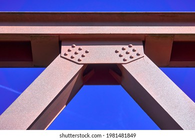 Pink Painted Steel Girder Of A Tied Arch Bridge In Front Of A Blue Sky, Abstract Cutout