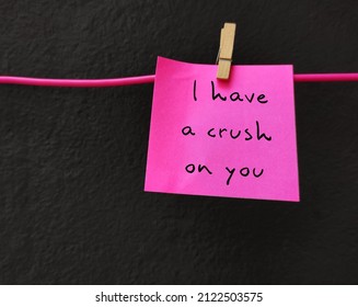 Pink Paper Note With Handwritten Text I HAVE A CRUSH ON YOU, Concept Of Love Confession On Valentines Day, To Tell Someone Have Feeling Of Romantic Love Unbeknownst To That Person