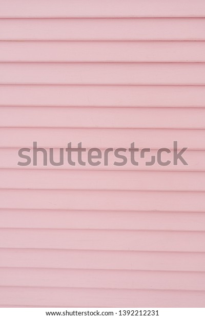 Pink Partition\
Wooden Screen Panel Room Divider. Bamboo Wood Folding Boudoir\
Background Close-up Texture.\
