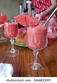 Pink Party Table Spread On Wooden Table