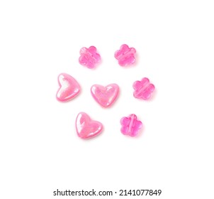 Pink Pearly Bead Hearts And Flowers Isolated. Beading Craft Accessory, Beads Pile, Beadwork Handicraft Elements On White Background Top View