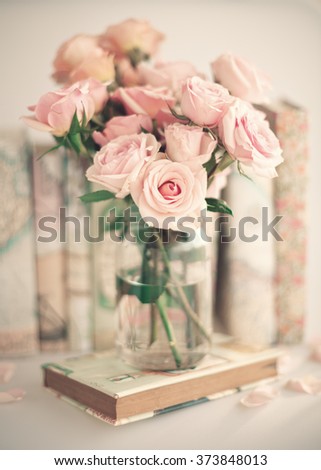 Similar – Woman decorated large bouquet of flowers with roses in vase