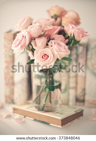 Similar – Woman decorated large bouquet of flowers with roses in vase