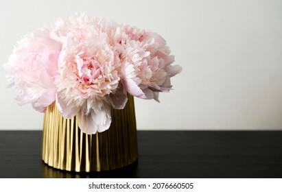 Pink peony flower bouquet on white background