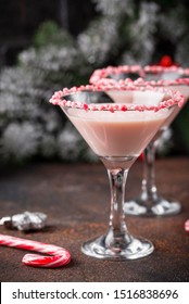 Pink Peppermint Martini With Candy Cane Rim. Christmas Cocktail