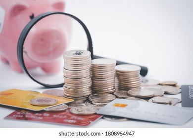 Pink Piggy Bank With Coins Stack And Visa Card Model On White Background, Money Spending Planning, And Investment Budget, Business Saving Money Concept, Copy Space