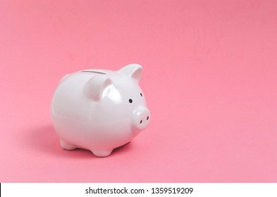 Pink piggy bank on pink background. Money and business. - Shutterstock ID 1359519209