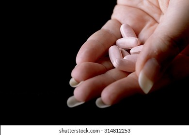 Pink Pills Under Female Hand Female Viagra